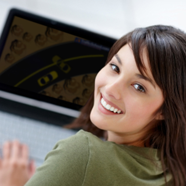 Woman completing traffic school course on laptop